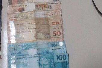 Dinheiro apreendido com motorista de caminhão com madeira ilegal