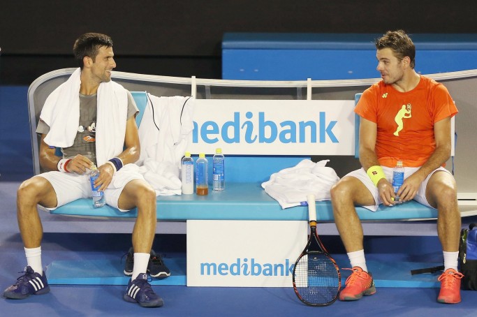 MELBOURNE, AUSTRALIA - JANUARY 14: Novak Djokovic of Serbia talks with Stan Wawrinka of Switzerland during a practice session ahead of the 2016 Australian Open at Melbourne Park on January 14, 2016 in Melbourne, Australia. (Photo by Michael Dodge/Getty Images)